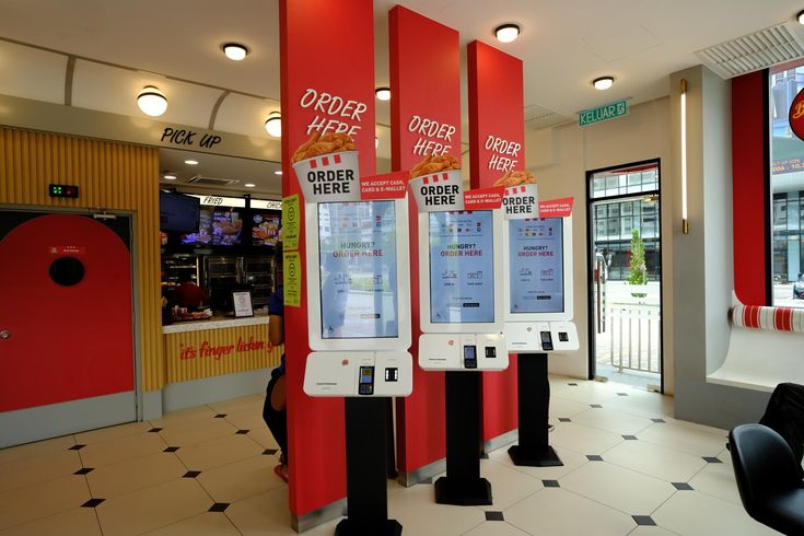 Customer using kiosk